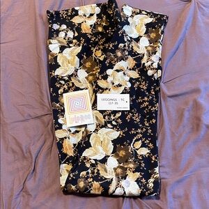 LuLaRoe Black Leggings with Cream and Tan Floral Design